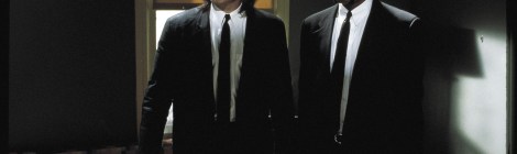 John Travolta and Samuel L. Jackson are shown in a scene from "Pulp Fiction." (Photo credit: Miramax Films)