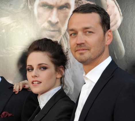 This May 29, 2012, file photo shows actress Kristen Stewart and director Rupert Sanders attending the "Snow White and the Huntsman" screening in Los Angeles. Stewart and director Rupert Sanders are apologizing publicly to their loved ones following reports of infidelity. The 22-year-old actress and the 41-year-old filmmaker issued separate apologies to People magazine Wednesday, July 25, saying they regret the hurt they have caused. Stewart has been in a relationship for several years with her "Twilight" co-star Robert Pattinson. Sanders is married and has two children. (Photo by Jordan Strauss/Invision/AP)
