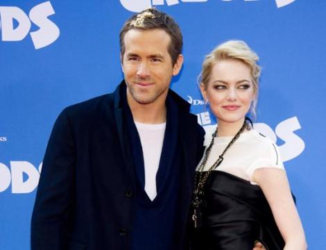 Above, Ryan Reynolds and Emma Stone. (Photo credit: AP photo)