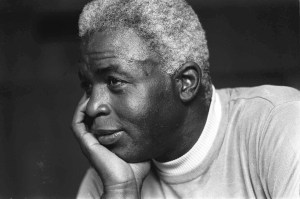 In this June 30, 1971, file photo, Jackie Robinson poses at his home in Stamford, Conn. (Photo credit: AP file photo)