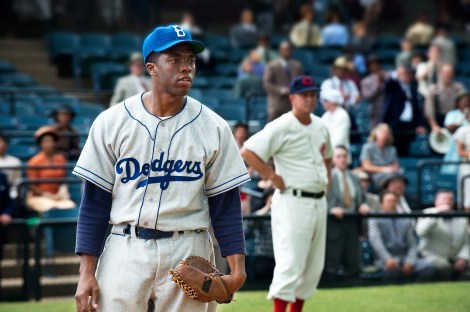 Above, Chadwick Boseman as Jackie Robinson in a scene from "42." Kansas City's Negro Leagues Baseball Museum is hosting an advance screening of a movie about Jackie Robinson, who broke major league baseball's color barrier. (Photo credit: AP photo by Warner Bros. Pictures, D. Stevens)